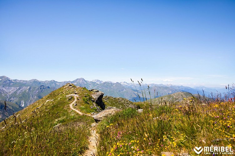 R6 - Afdaling van de Tougnète-top - Vertrek Méribel