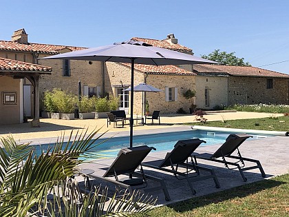 Chambre en pierre - Gîte Monpazier