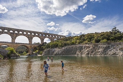 Swimming at the foot of the Pont du Gard