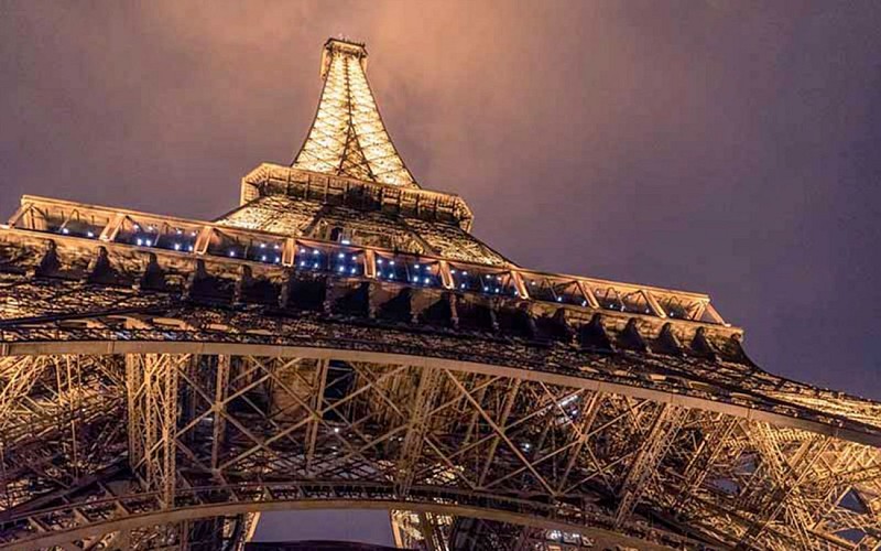 Skip the Line Eiffel Tower After Dark with Champagne River Cruise