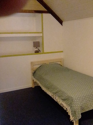 Chambre avec deux lits