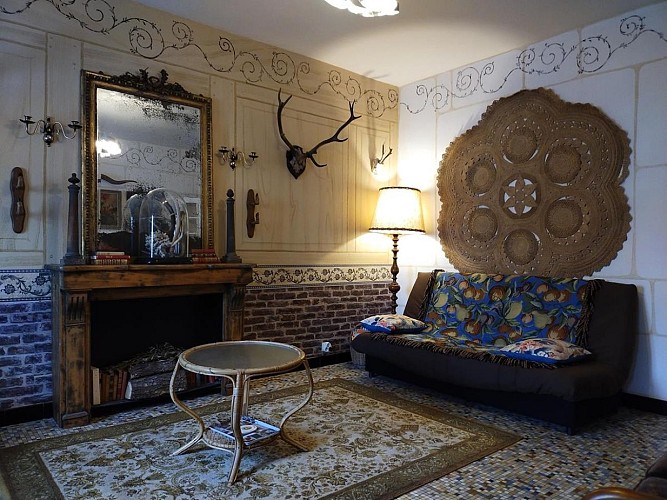 Fauteuils et canapé convertible Clic-Clac dans le salon