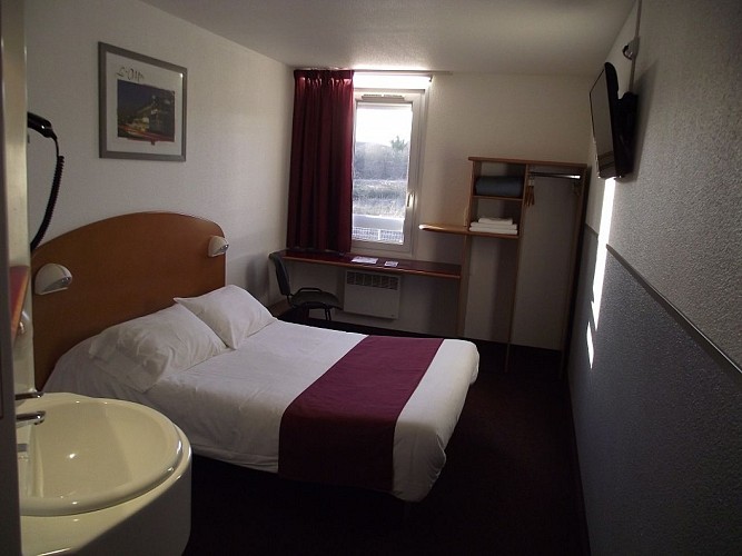 Chambre à grand lit