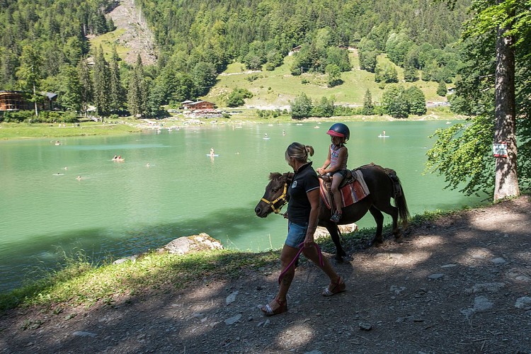 Poney riding at Montriond Lake