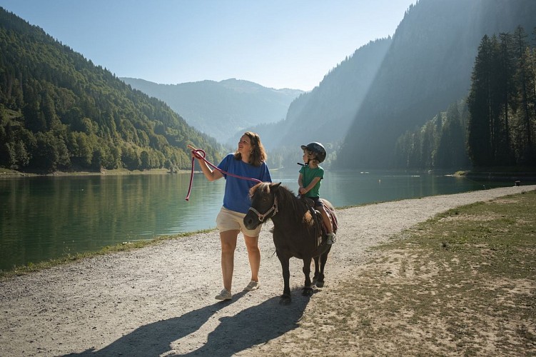 Poney riding at Montriond Lake
