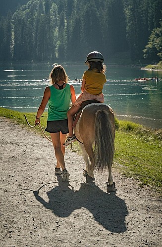 Poney riding at Montriond Lake