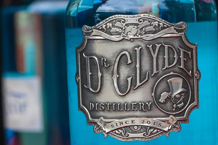 Distillerie "Dr Clyde'spirits" - Ecusson Bouteille d'Elixir