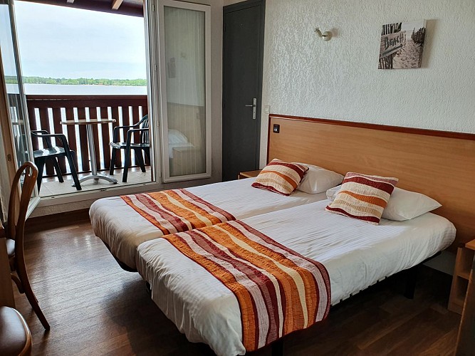 Chambre appartement 2 lits simples