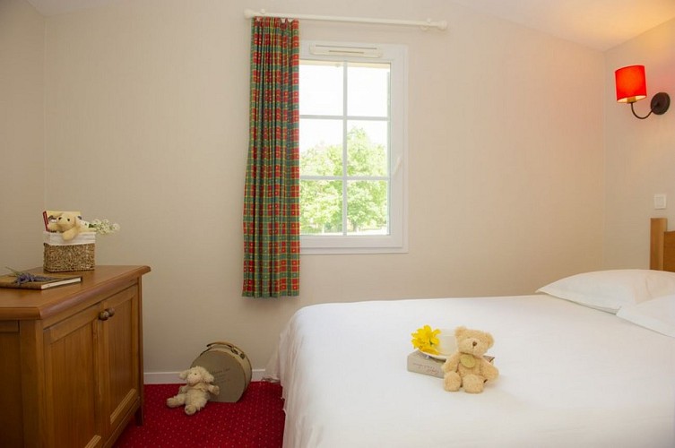 Monflanquin - Résidence Pierre et Vacances - chambre appartement [800x600]