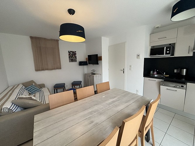 Maison dans un village vacances avec une pisicne collective.