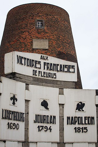 Naveau Windmill and the Monument to the three victories