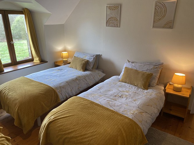 Chambre avec 3 lits simples