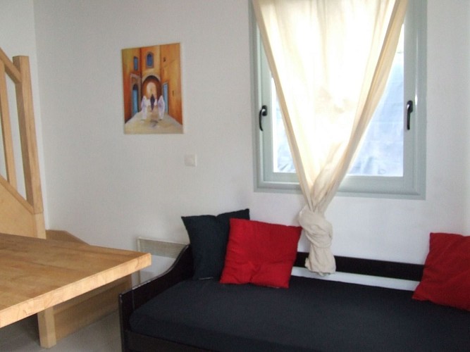 vue canapé + fenêtre côté