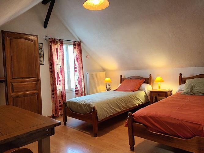 Chambre double à l'étage