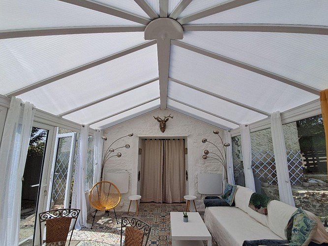 Le Lodge Conservatory interieur viewed from Main Entrance