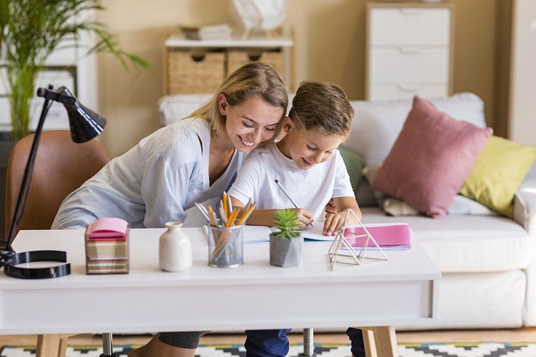 mother-son-doing-homework-indoors