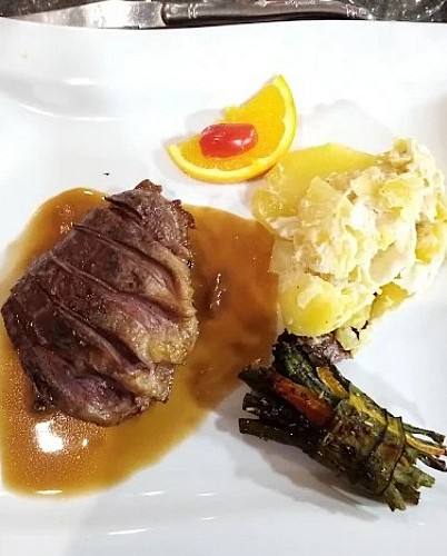 Magret de canard au poivre vert