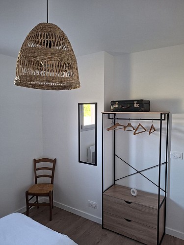 Gîte l'UNIK - chambre La_fotêt_rangement