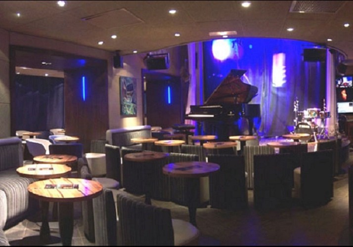 100% Jazz Evening – Guided Tour, Concert and Appetizers at the Duc des Lombards - In French