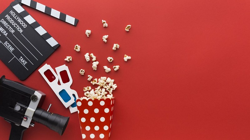 cinema-elements-on-red-background-with-copy-space