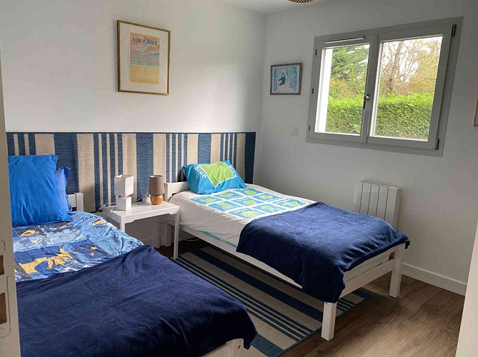 chambre 2 lits de 90 qui peuvent être rapprochés