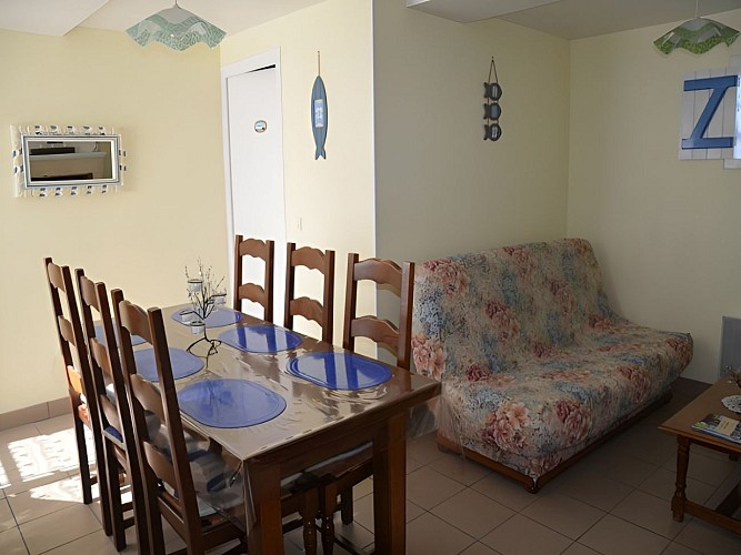 Location à Arromanches, séjour-salon