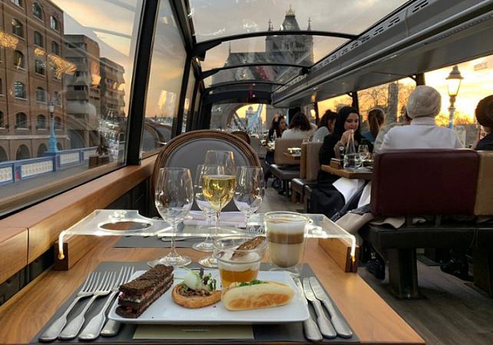 Dinner aboard the top-deck of a bus: Bustronome - London