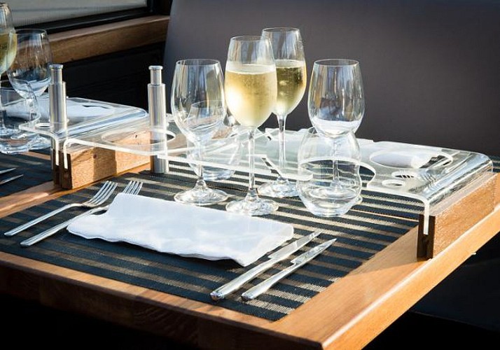 Dinner aboard the top-deck of a bus: Bustronome - London