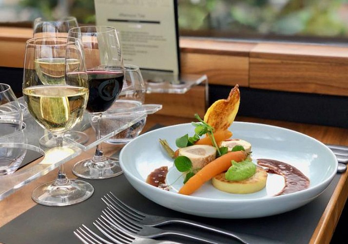 Dinner aboard the top-deck of a bus: Bustronome - London