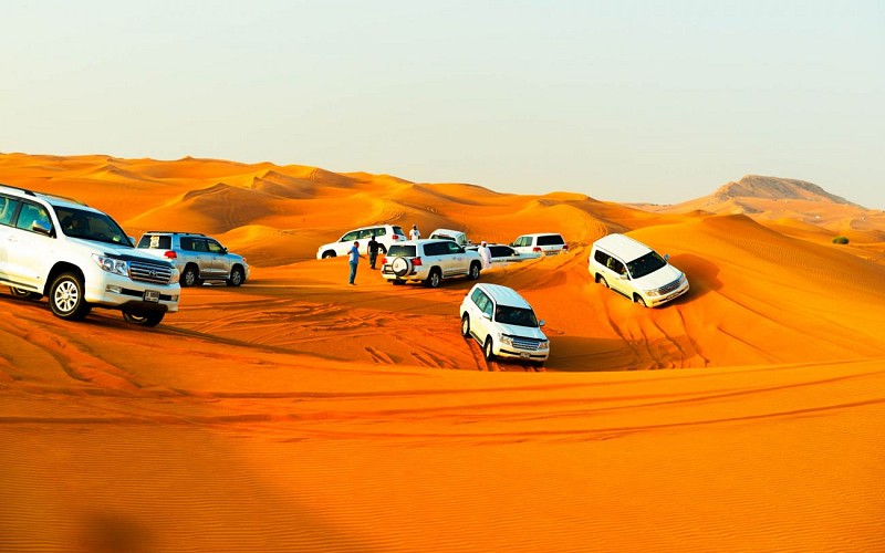 Arabian Dune Desert Safari with Sandboarding, Camel Ride & BBQ Dinner