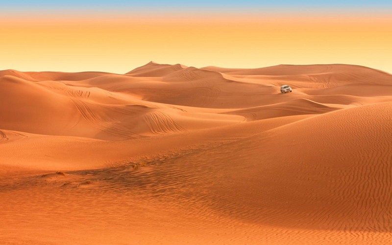 Arabian Dune Desert Safari with Sandboarding, Camel Ride & BBQ Dinner