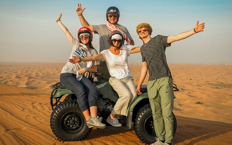 Premium Morning Quad Bike, Sandboarding and Camel Ride