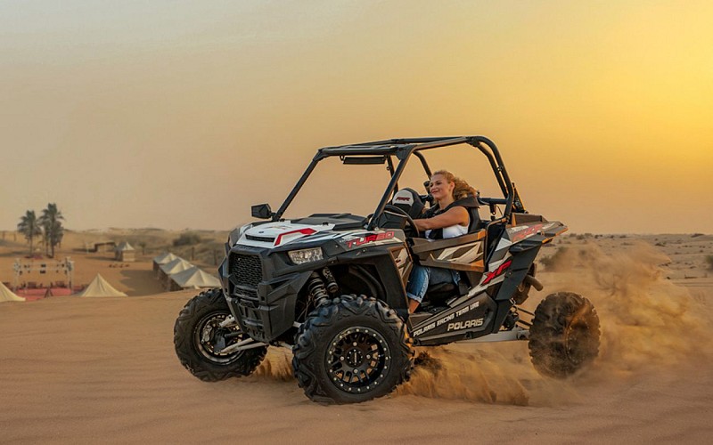 Premium Morning Quad Bike, Sandboarding and Camel Ride