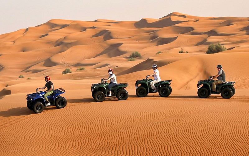 Premium Morning Quad Bike, Sandboarding and Camel Ride